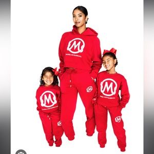 Red Mambacita foundation sweatsuit.